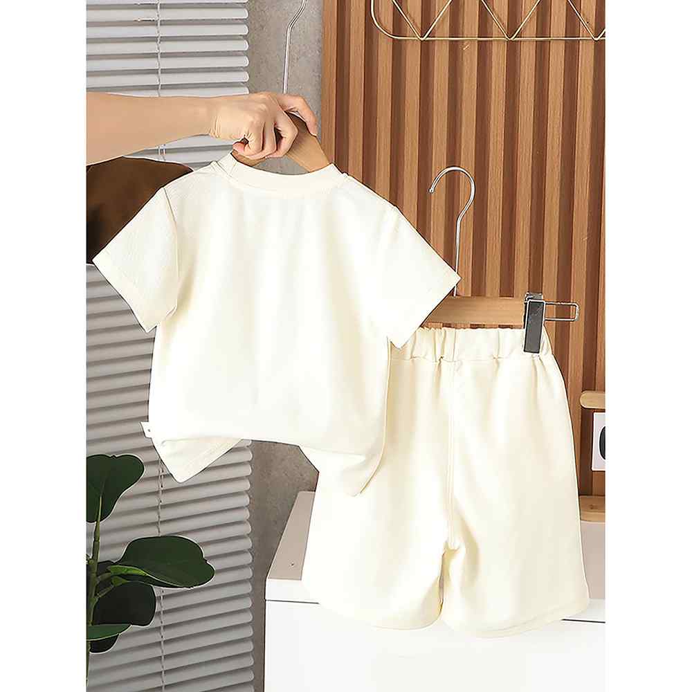 Cream Doggy Paw 2pcs Shorts set for Toddlers and Kids.