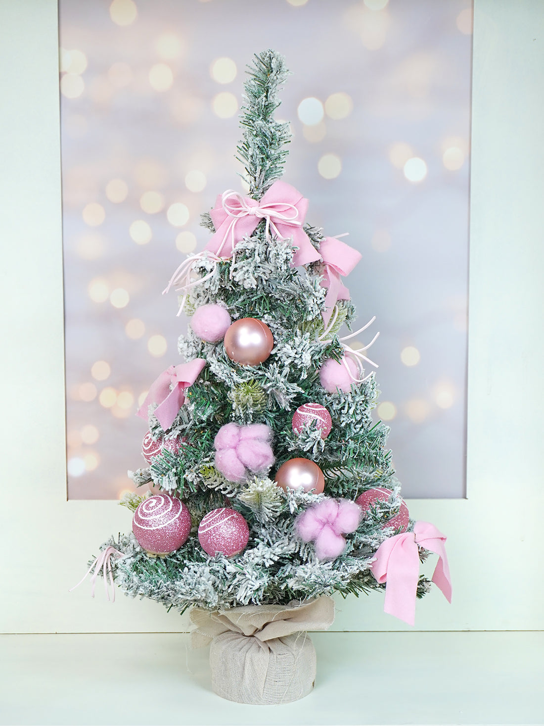 2 feet pastel Pink Swirl Snowy Bushy Christmas Tree filled with balls and ornament Fillers