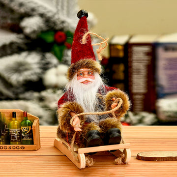 Red Brown Sitting Sledge Santa - Christmas Table Décor & Ornament