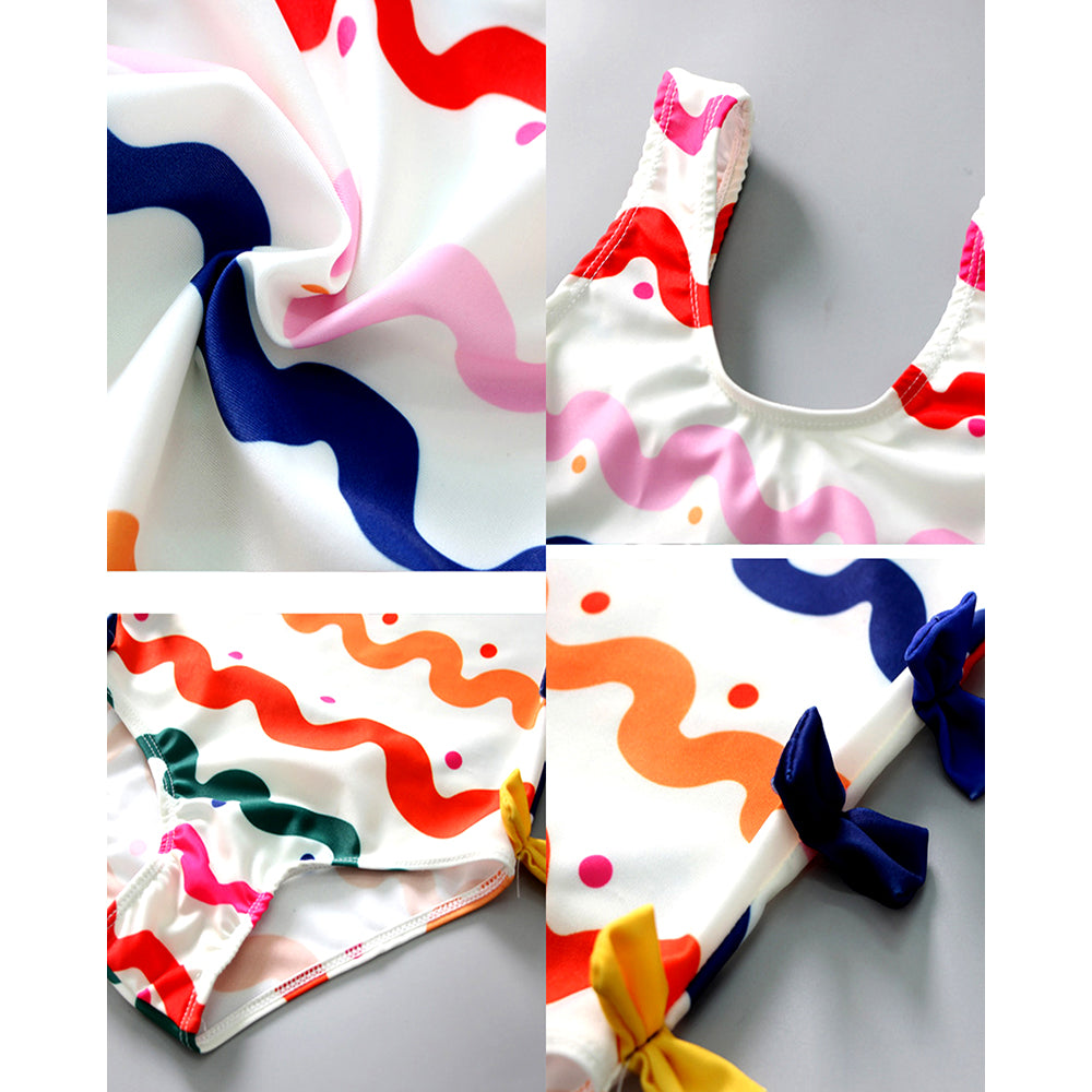 Multi Bows & Waves , Toddlers & Kids Swimwear with matching Swim Cap, plus Free Wash Bag & Free Swim Detergent