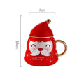 Merry Christmas Ceramic Coffee and Hot Chocolate Mug - Red Santa Face style Cup with Matching Cap Style Ceramic Lid and embellished Spoon, 330 ml - Little Surprise BoxMerry Christmas Ceramic Coffee and Hot Chocolate Mug - Red Santa Face style Cup with Matching Cap Style Ceramic Lid and embellished Spoon, 330 ml