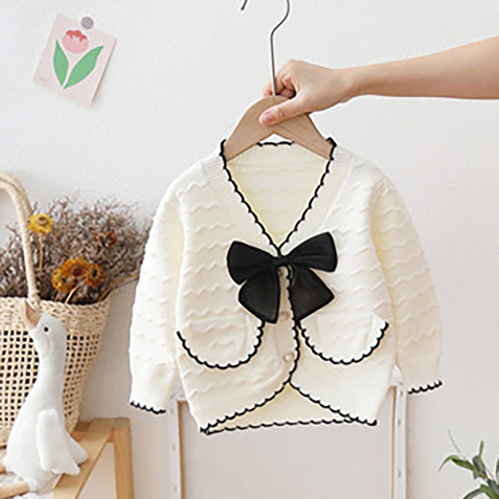 White Ruffled Cardigan with Big black Bow Winter Warmer Sweater for Toddlers & Kids - Little Surprise BoxWhite Ruffled Cardigan with Big black Bow Winter Warmer Sweater for Toddlers & Kids